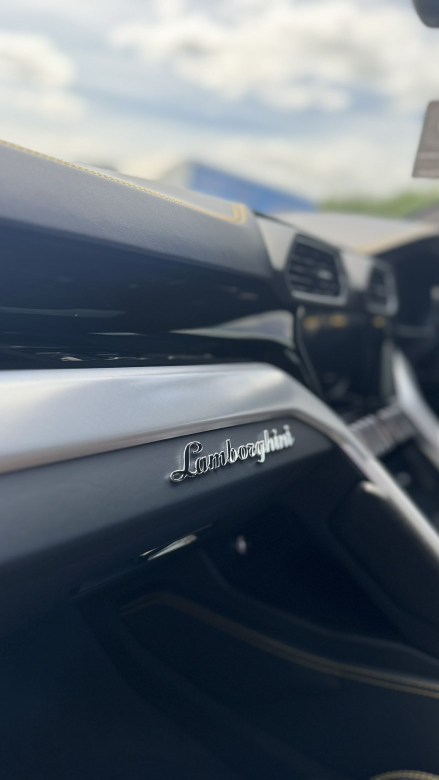 Lamborghini dashboard trim and contrast stitching cleaned and protected